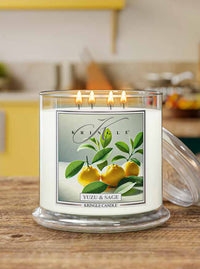 Kringle Candle with Yuzu & Sage flavor on a wooden surface