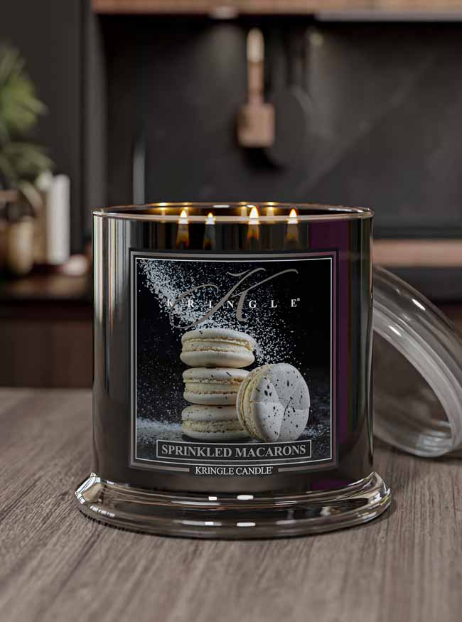 Kringle Candle with 'Sprinkled Macarons' design on a black background