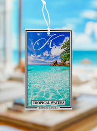 Kringle Candle Tropical Waters air freshener with a scenic background