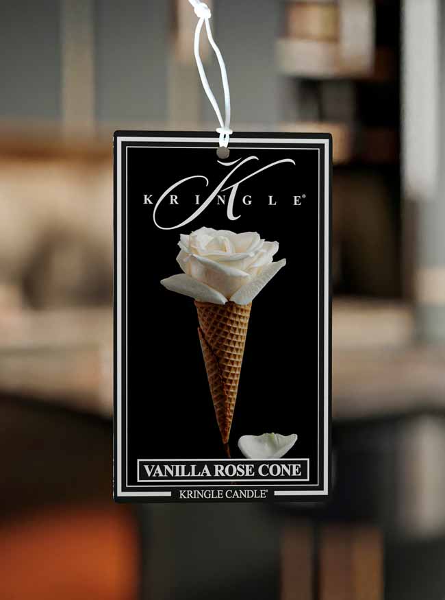 Kringle Candle Vanilla Rose Cone air freshener with a white rose in a waffle cone on a black background.