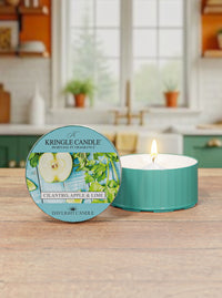 Kringle Candle daylight candle with packaging on a wooden surface in a kitchen setting