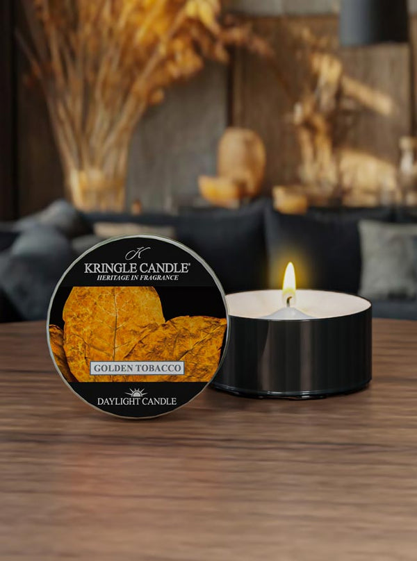 Krkole Candle Golden Tobacco candle on a wooden surface with a blurred background