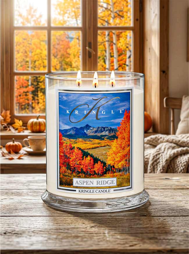Kringle Candle with 'Aspen Ridge' label in a room with autumn decor