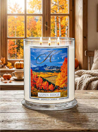 Kringle Candle with 'Aspen Ridge' label in a room with autumn decor
