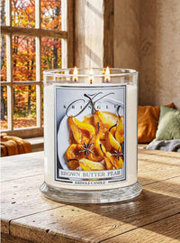 Brown Butter Pear Candle by Kringle Candle on a wood dining room table with fall decor