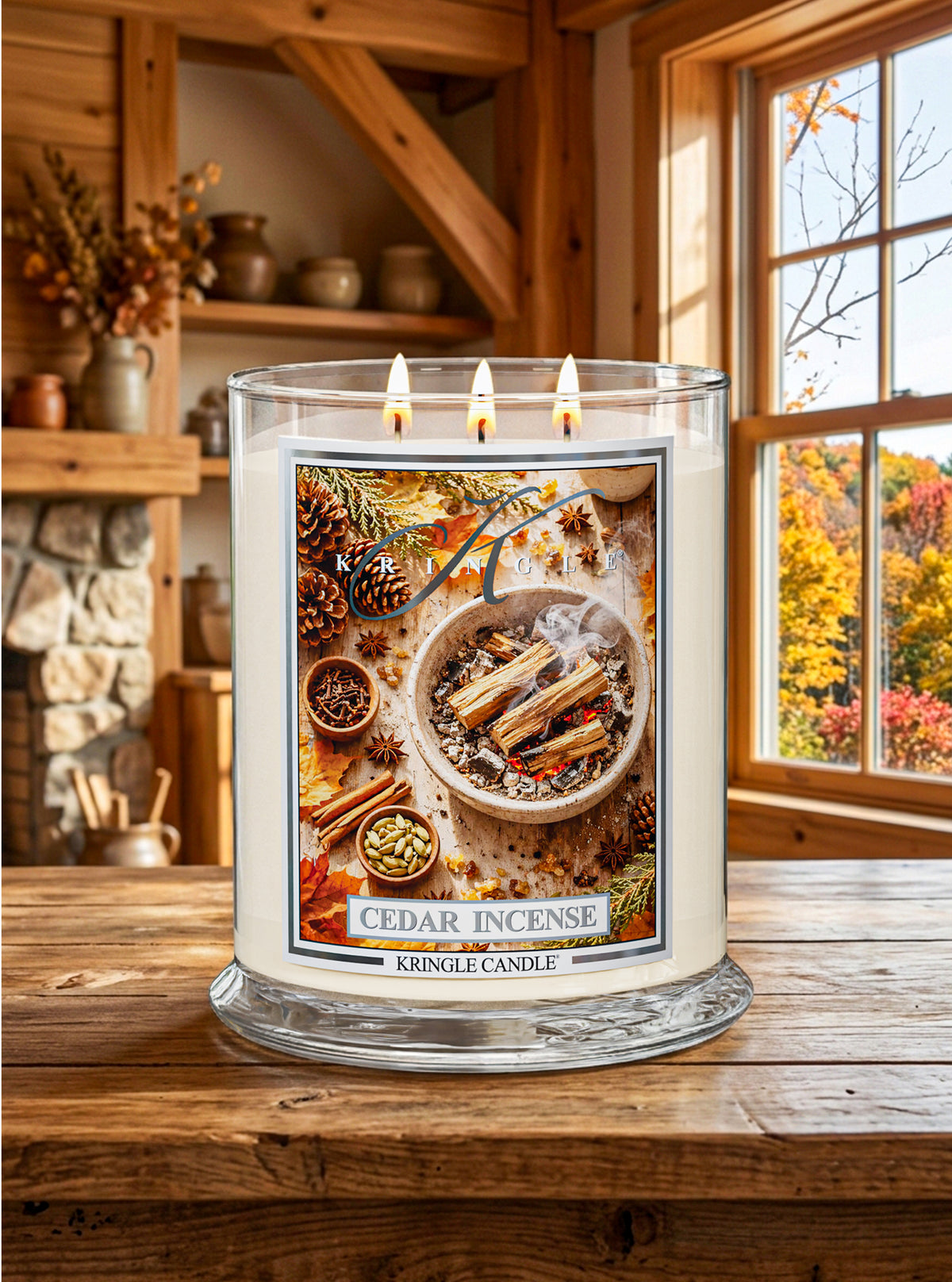 Cedar Incense Candle by Kringle Candle in a lifestyle photo with fall decor