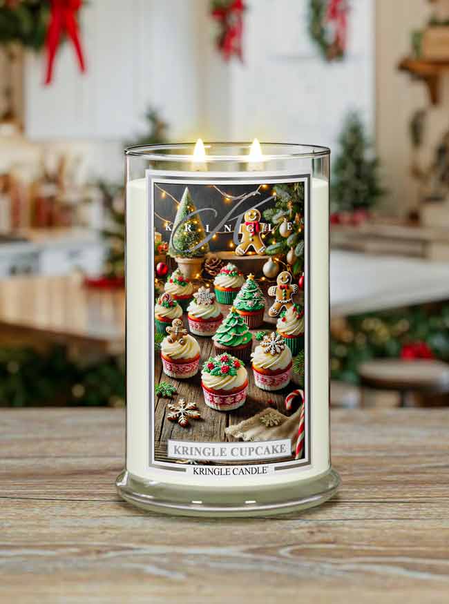 Kringle Candle with Kringle Cupcake design on a wooden surface