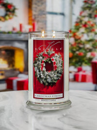 Kringle Candle with Christmas wreath design in a festive setting