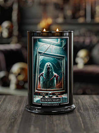 Kringle Candle with 'Bloody Mary' design on a wooden surface with a blurred background.