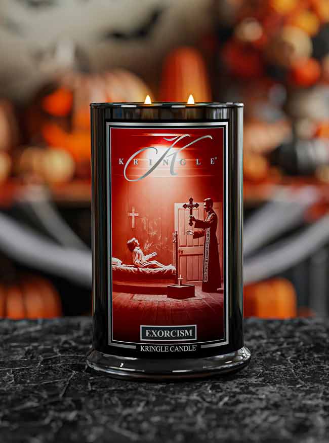 Kringle Candle Exorcism Halloween Candle with a dark background