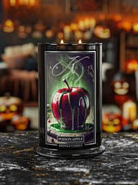 Kringle Candle Poison Apple candle with a Halloween-themed label on a dark surface.