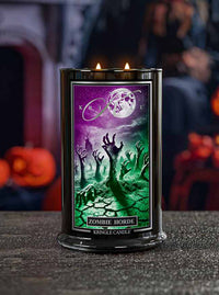 Kringle Candle Zombie Horde candle with a Halloween-themed label on a dark surface.