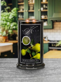 Kringle Candle with pear and green tea design on a kitchen counter