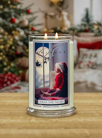 Kringle Candle with Christmas-themed design on a table in a festive setting