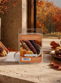 Autumn Harvest Wax Melt packaging in an autumn setting and decor on window sill