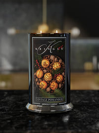 Vintage Pomander Large 2-wick candle on a marble-top surface - Kringle Candle Company