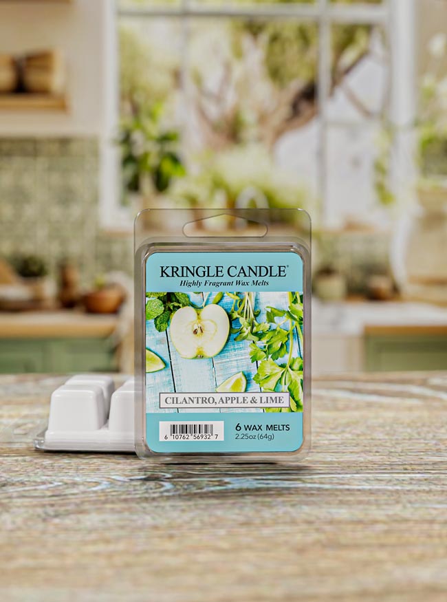 Kringle Candle Cilantro, Apple & Lime wax melts packaging on a kitchen counter.