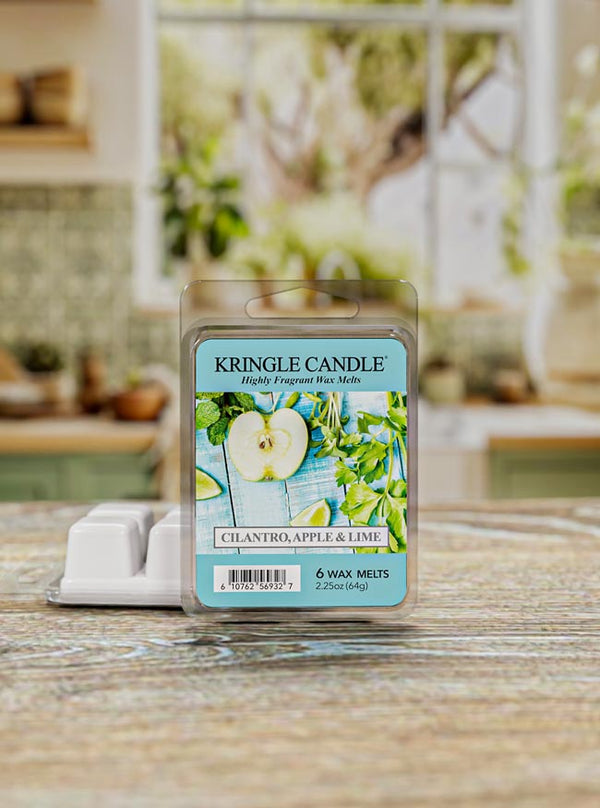 Kringle Candle Cilantro, Apple & Lime wax melts packaging on a kitchen counter.