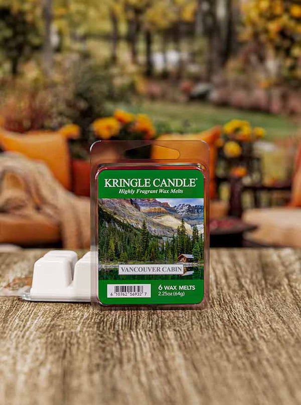 Wax melt pack "Vancouver Cabin" with a label image of a forested mountain landscape and a cabin by a lake.