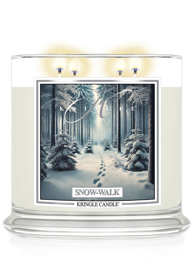 Kringle Candle's Snow-Walk, a 4-wick candle, features a snowy forest scene on the label.