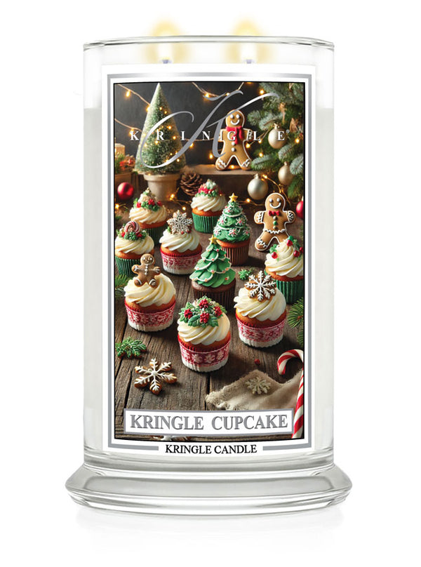 "Kringle Candle large jar with holiday-themed label featuring cupcakes, gingerbread men, and Christmas trees."