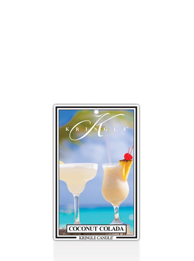 Label with two coconut coladas in glasses against a tropical beach backdrop. Text reads 