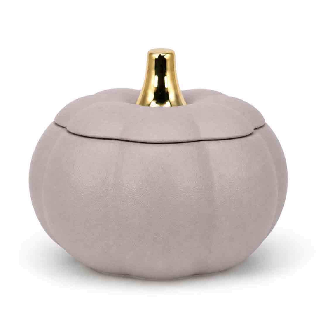 A small decorative pumpkin-shaped container with a lid, finished in a matte dusty lavender-gray color with a shiny gold stem, set against a plain white background.
