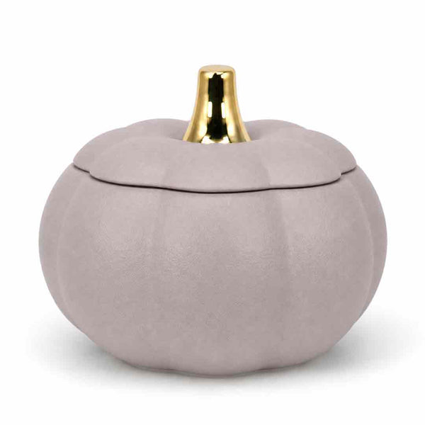 A small decorative pumpkin-shaped container with a lid, finished in a matte dusty lavender-gray color with a shiny gold stem, set against a plain white background.