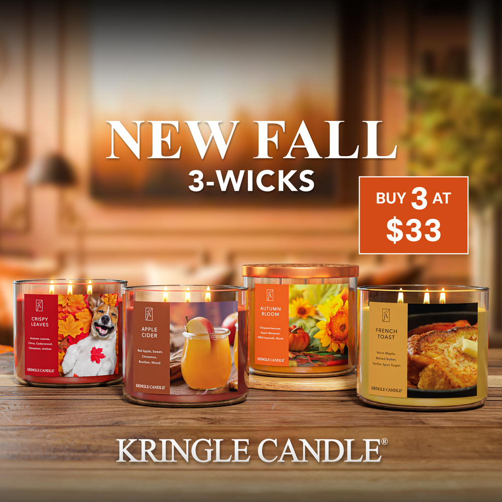 Kringle Candle fall-themed candles on a wooden surface with promotional text 3 for $33 text.