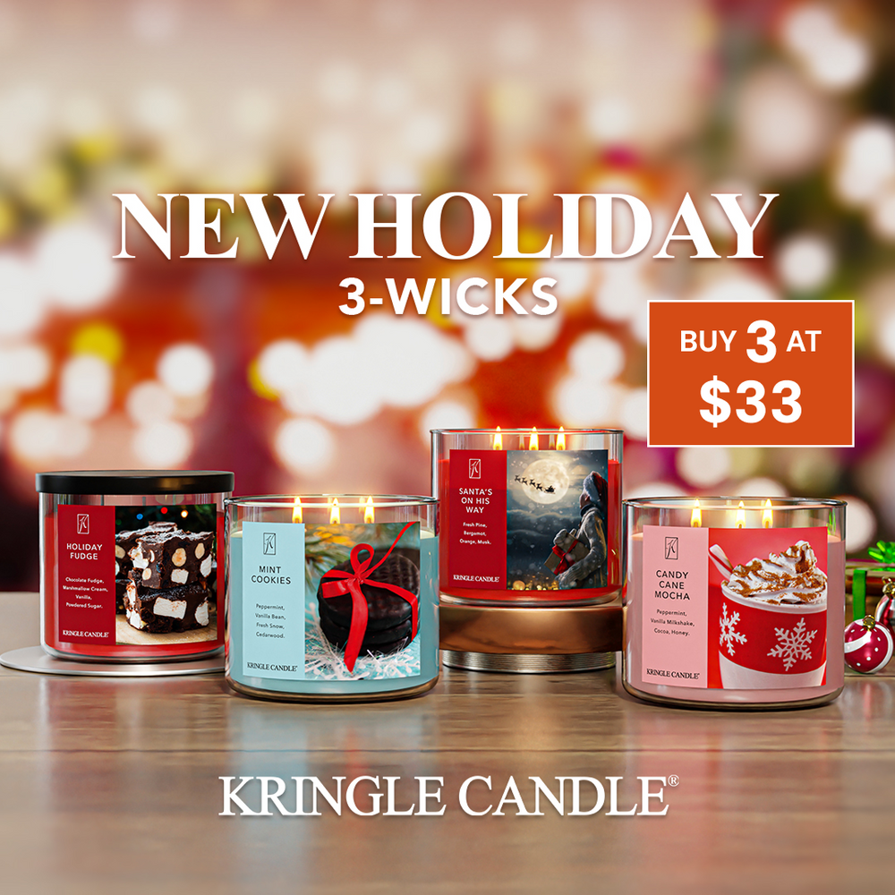 Kringle Candle holiday candles with a festive background and 3 for $33 sale.