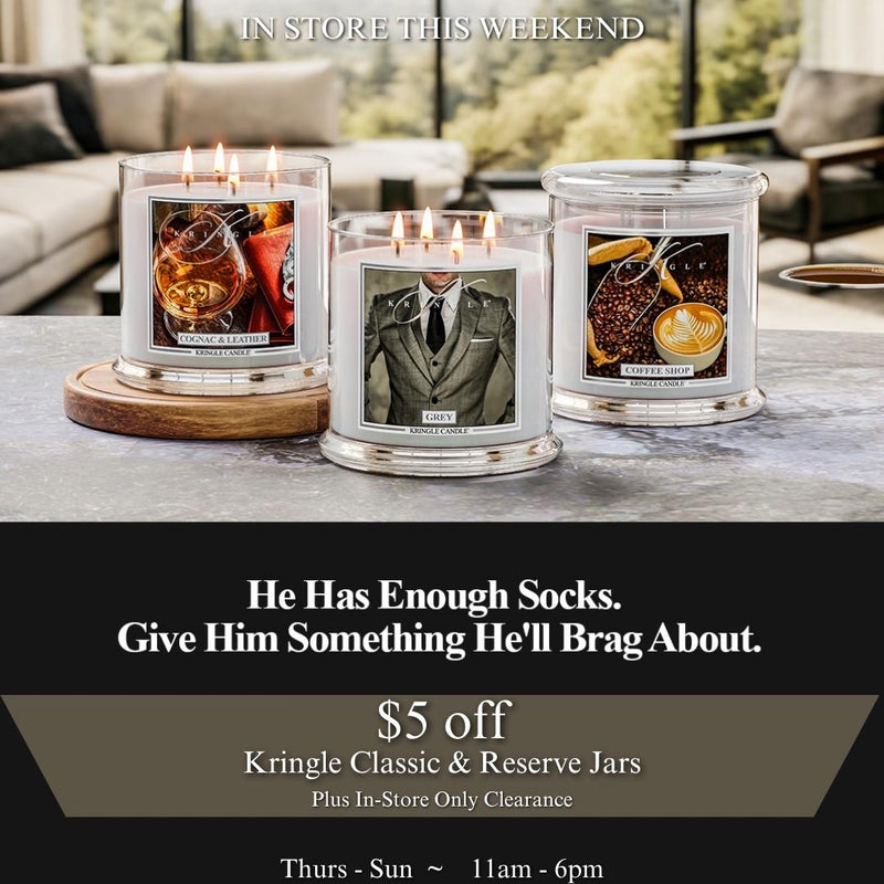 Kringle Candle in-store weekend event graphic featuring Cognac and Leather, Grey, and Coffee Shop candles with the tagline He Has Enough Socks, $5 off Classic and Reserve Jars, in-store clearance, and store hours.