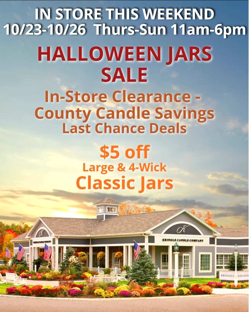 Promotional image for Kringle Candle’s in-store weekend sale. The text reads “IN STORE THIS WEEKEND 10/23–10/26 Thurs–Sun 11am–6pm. HALLOWEEN JARS SALE. In-Store Clearance – County Candle Savings – Last Chance Deals. $5 off Large & 4-Wick Classic Jars.” The background shows the Kringle Candle Company store in Bernardston, Massachusetts, surrounded by colorful autumn mums and pumpkins beneath a warm evening sky.