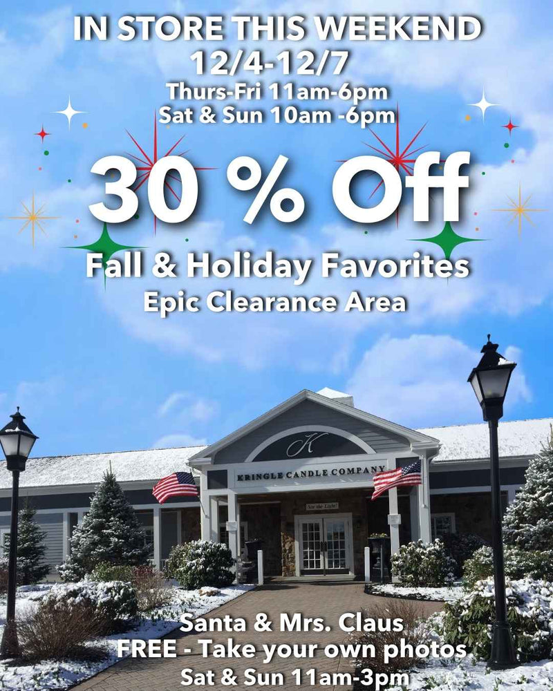 “Kringle Candle flagship store with snow-covered landscaping and festive graphics announcing in-store promotions: 30% off Fall and Holiday fragrances, store hours, and Santa & Mrs. Claus appearance details.”