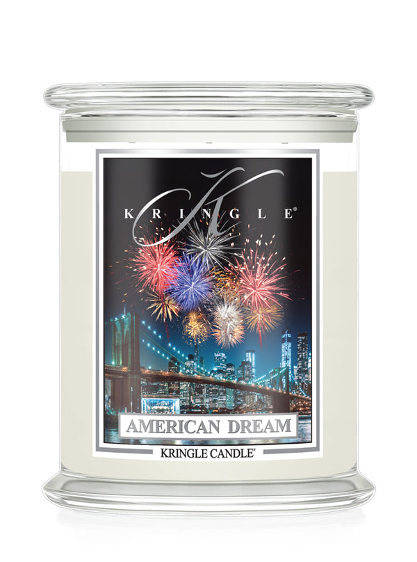 Kringle Candle with 'American Dream' design featuring fireworks and a cityscape.