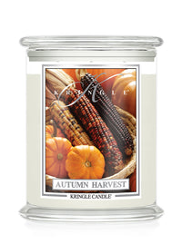 Autumn Harvest Kringle Candle with corn and pumpkins on label and a white background