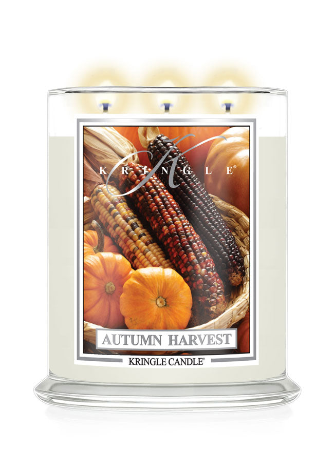 Autumn Harvest Kringle Candle with corn and pumpkins on label and a white background