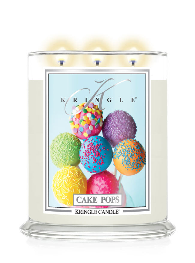 Kringle Candle with colorful cake pop design on a white background