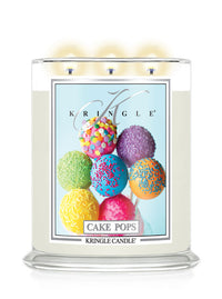 Kringle Candle with colorful cake pop design on a white background