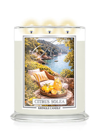 Kringle Candle Citrus Solea 3-wick candle with scenic label on a white background
