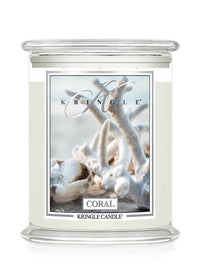 Kringle Candle with coral design on a white background