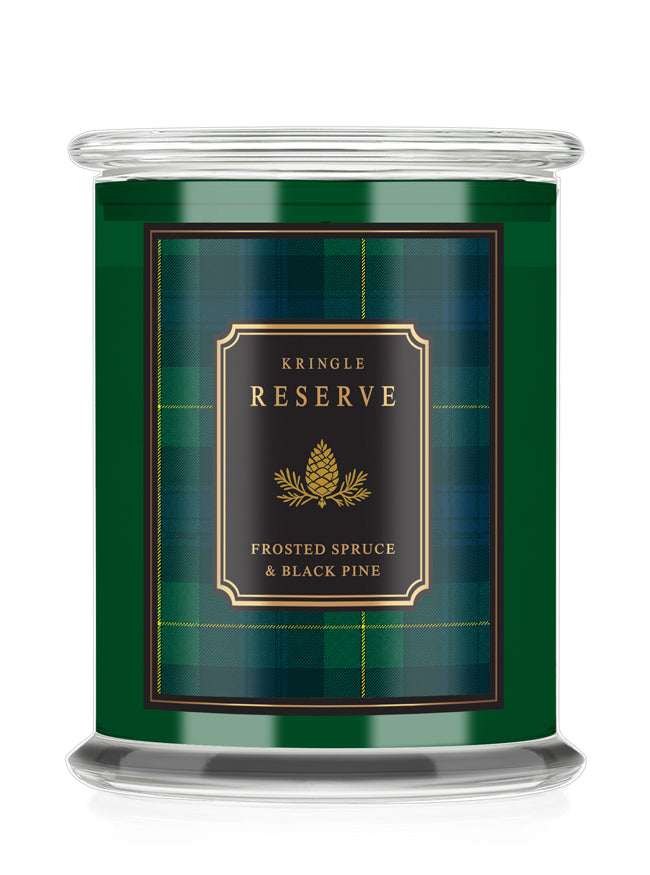 Kringle Candle Reserve green candle jar and plaid label with text "Frosted Spruce & Black Pine."