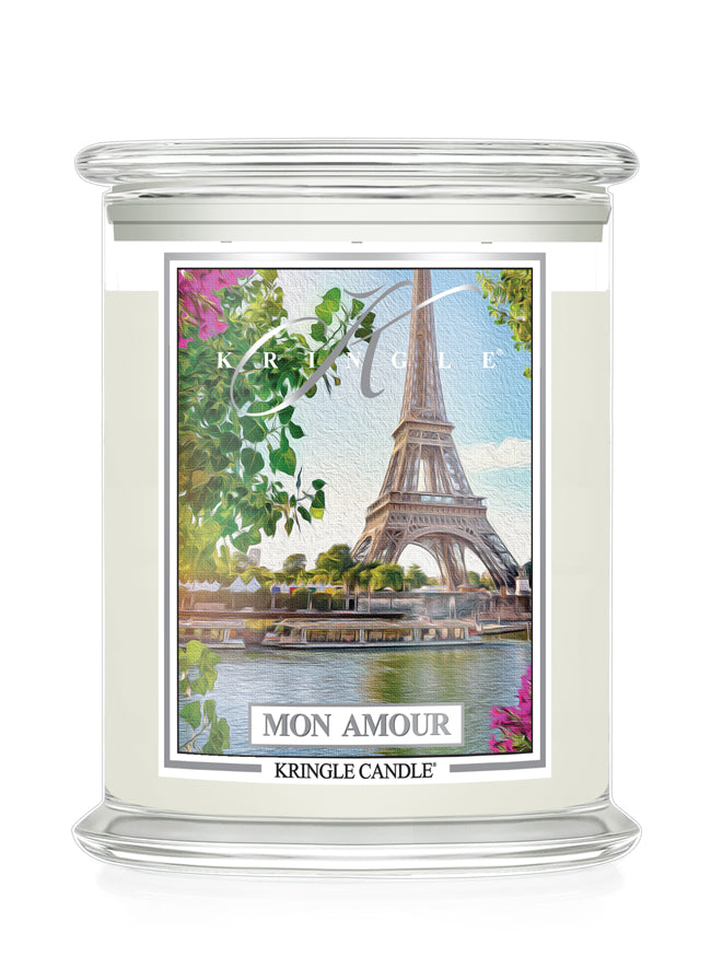 Kringle Candle Mon Amour candle with Eiffel Tower design on a white background