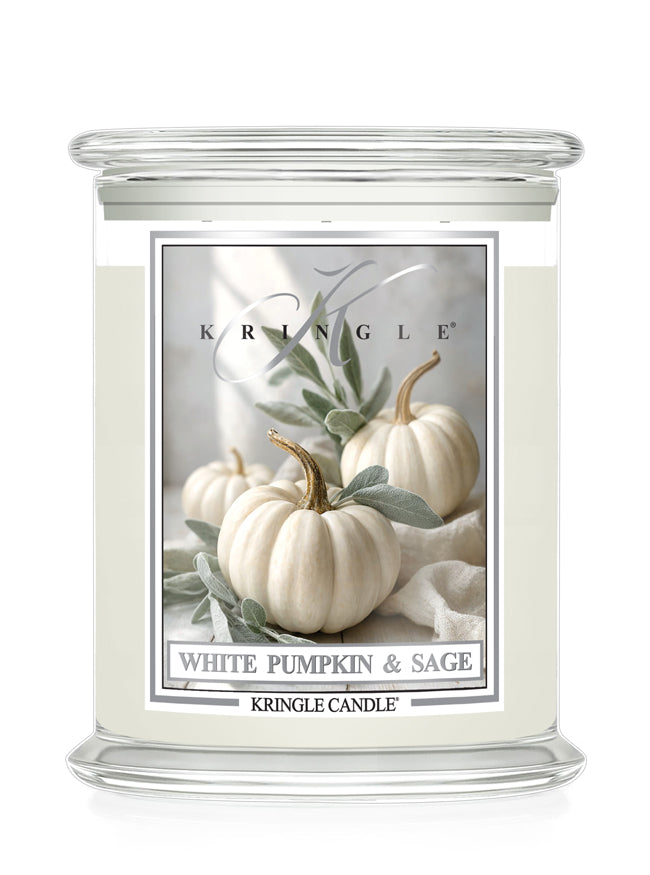 Kringle Candle with a label featuring white pumpkins and sage on a white background