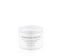 White candle tin container labeled 'American Dream' by Kringle on a white background