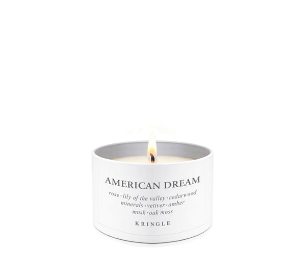 Kringle Candle with 'American Dream' scent in a tin candle container a white background
