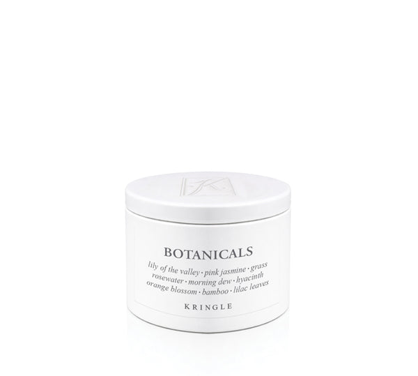 A white metal tin of Kringle Botanicals body wash with black text, set against a seamless white background.
