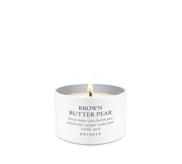 Candle labeled 'Brown Butter Pear' by Kringle on a white background
