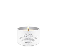 Candle labeled 'Cedar Incense' by Kringle on a white background