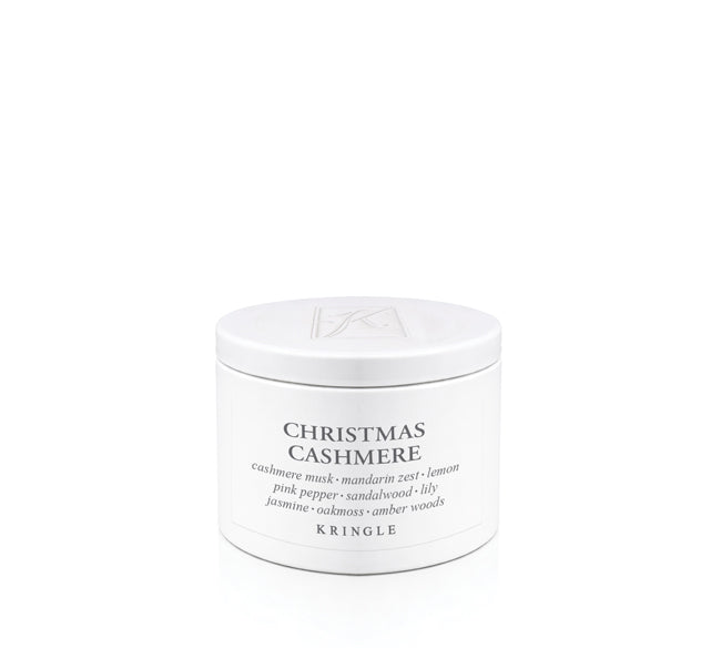 A white cylindrical jar of Kringle Christmas Cashmere hair mask with black text, set against a seamless white background.