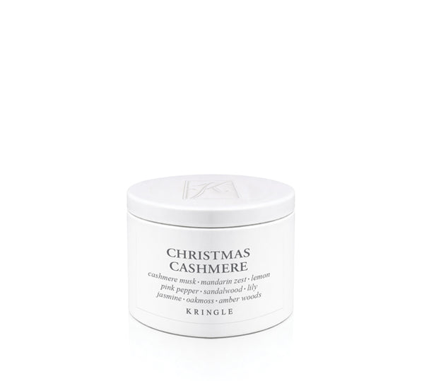 A white cylindrical jar of Kringle Christmas Cashmere hair mask with black text, set against a seamless white background.